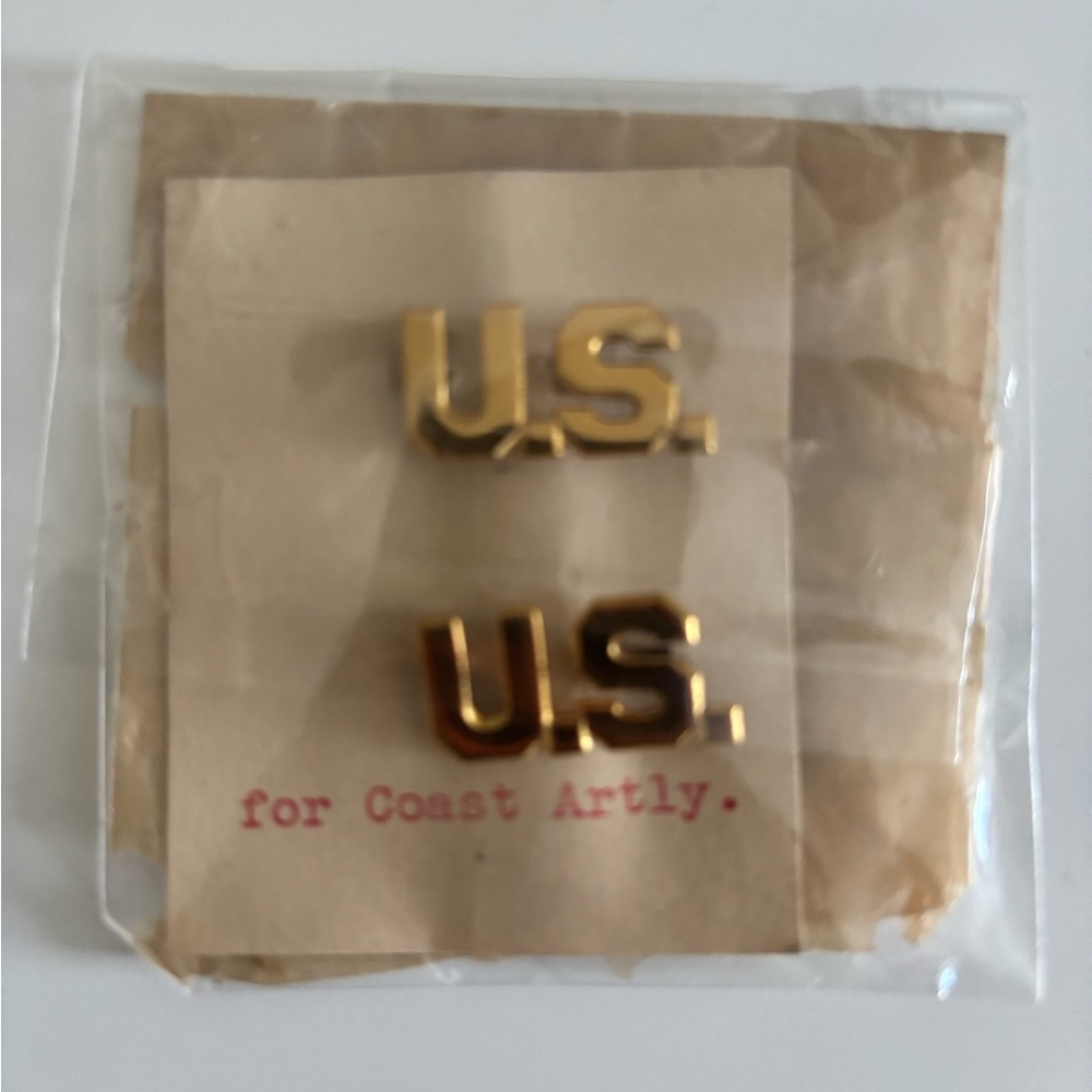 Vintage WWII army officer lapel pins with original card and packaging